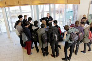 Dr. Lee Jones (STFC ASTeC) shows students how an electric field can be used to accelerate a charged particle