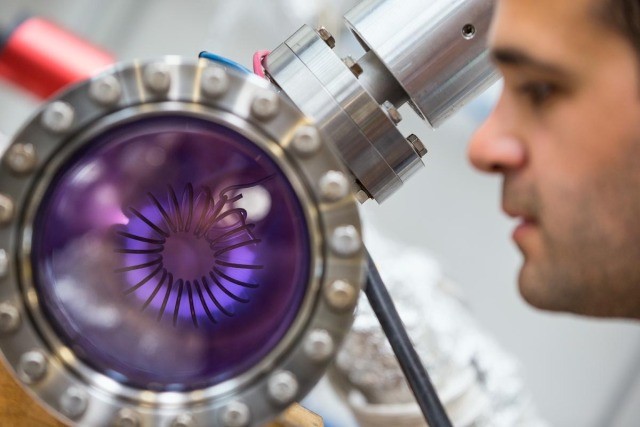 Thin-film coating of surfaces used to cover RF copper cavities with a thin superconducting layer that can boost their efficiency. Credits: Lois Lammerhuber, CERN.