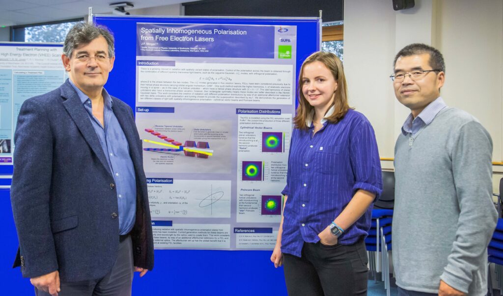 Jenny Morgan – winner of best poster - with Peter Ratoff and Guoxing Xia.