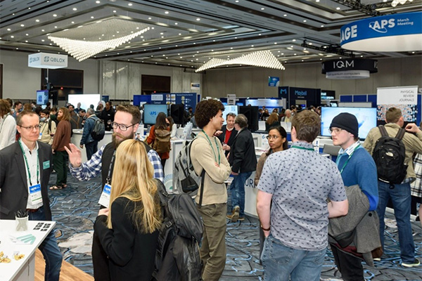 Group of people at an industry exhibition.