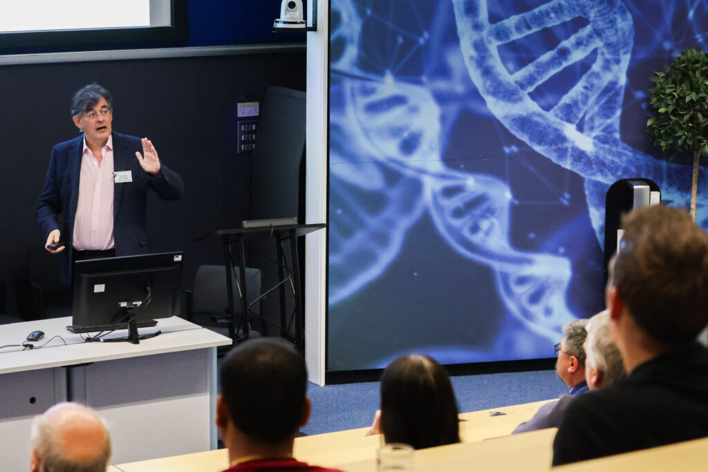 A person talking to the audience.