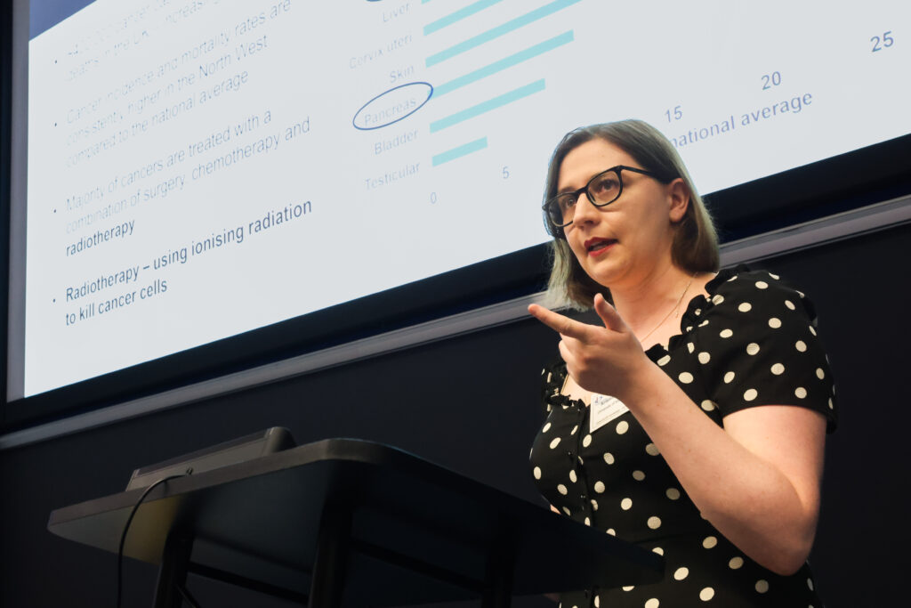 A person presenting a talk.