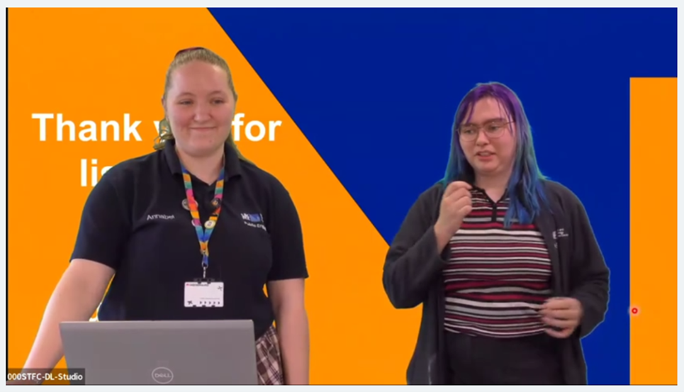 Two people smiling and welcoming the audience online.