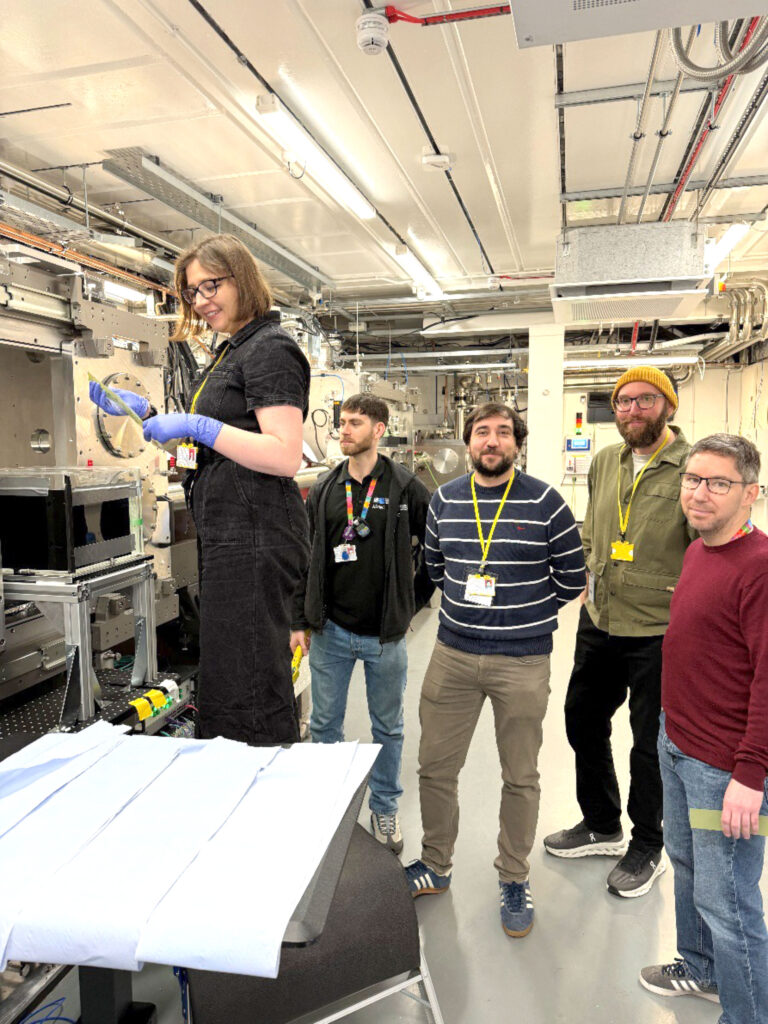 the team retrieving irradiated radiochromic film (from left to right: Kristina Small, Brad Wilson, Fabio D’Andrea, Nick Henshaw, James Jones)