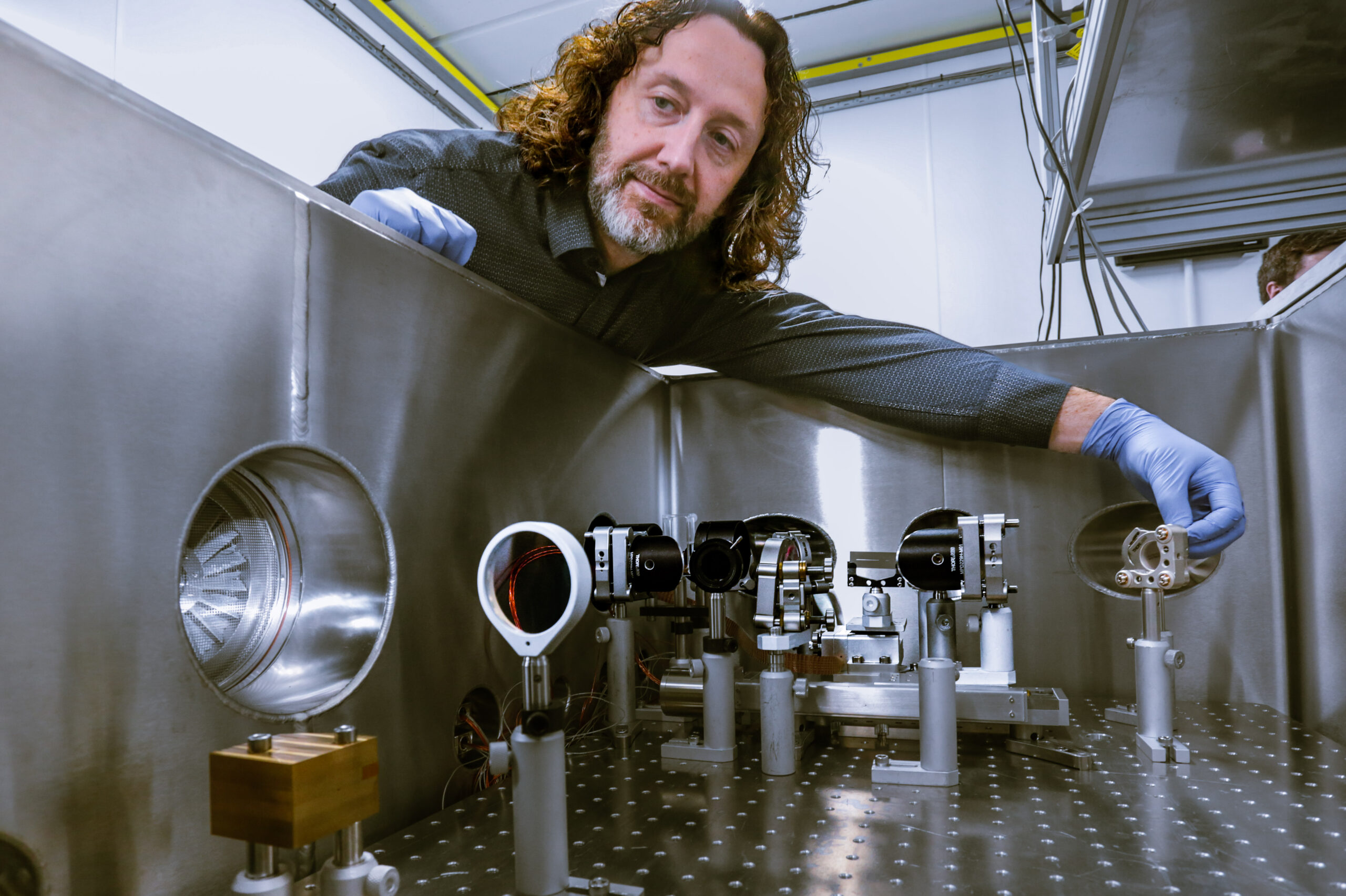 researcher setting up optics in the terrahertz bunker